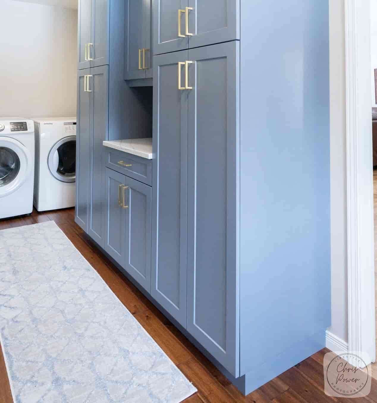 Blue cabinets in laundry room